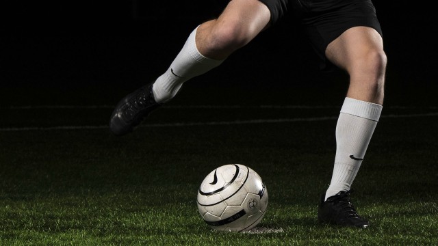 football ball on FieldTurf field